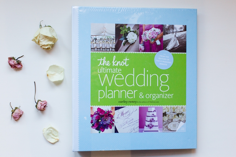  Shelby gave me this wedding planning book so I thought I'd snap a picture of it with the flowers of my bouquet from their wedding. 